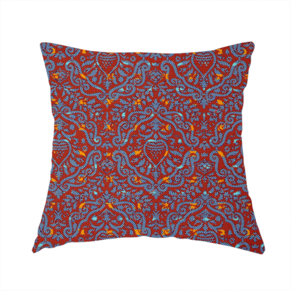 The fabric used to create this handmade cushion is a highly detailed, textured damask that blends traditional ornate motifs with a modern, high-energy colour palette.