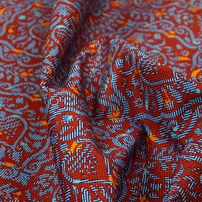 A highly detailed, textured damask that blends traditional ornate motifs with a modern, high-energy colour palette.