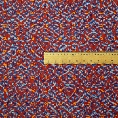 A highly detailed, textured damask that blends traditional ornate motifs with a modern, high-energy colour palette.