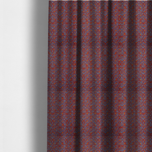 The fabric used to create these made-to-measure curtains is a highly detailed, textured damask that blends traditional ornate motifs with a modern, high-energy colour palette.
