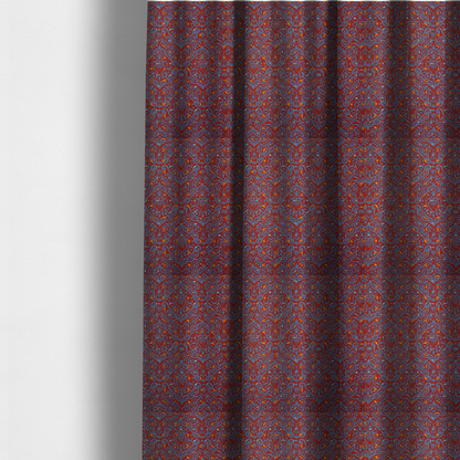 The fabric used to create these made-to-measure curtains is a highly detailed, textured damask that blends traditional ornate motifs with a modern, high-energy colour palette.