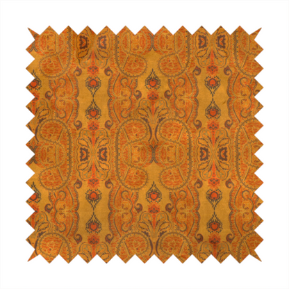 A warm, vintage-style paisley pattern with a weathered, antique tapestry aesthetic.