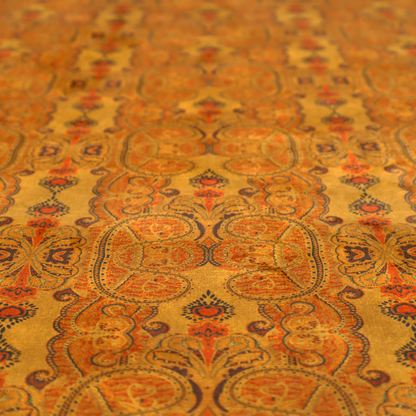 A warm, vintage-style paisley pattern with a weathered, antique tapestry aesthetic.