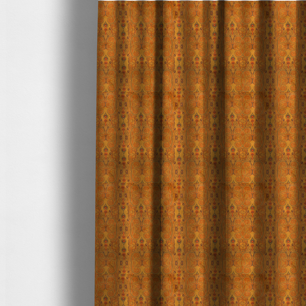 The fabric used to create these made-to-measure curtains is a warm, vintage-style paisley pattern with a weathered, antique tapestry aesthetic.