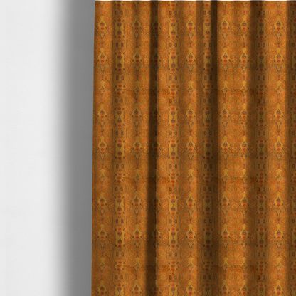 The fabric used to create these made-to-measure curtains is a warm, vintage-style paisley pattern with a weathered, antique tapestry aesthetic.