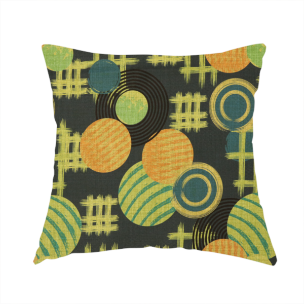 The fabric used to create this handmade cushion is a playful, mid-century modern-inspired pattern featuring layered circular and linear motifs.