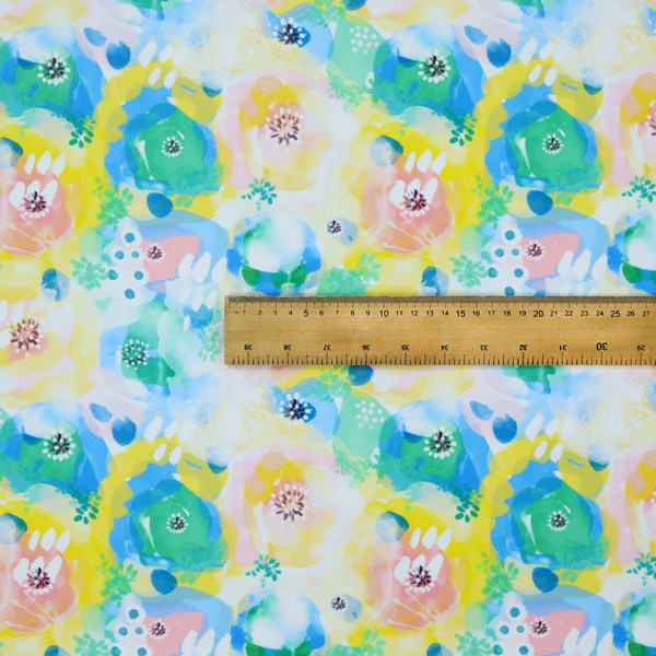 A vibrant, watercolour floral pattern with a bright and airy spring aesthetic.
