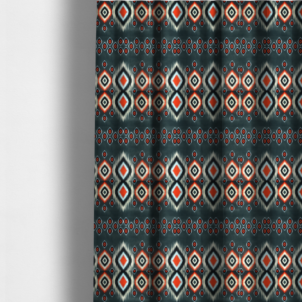The fabric used to create these made-to-measure curtains is a bold, high-contrast Ikat textile pattern with a modern tribal aesthetic.