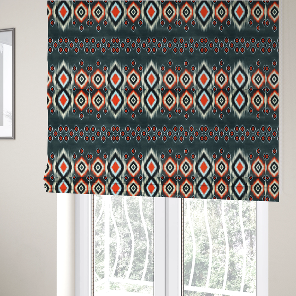 The fabric used to create these Roman blinds is a bold, high-contrast Ikat textile pattern with a modern tribal aesthetic.