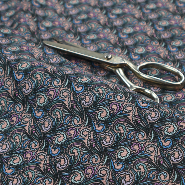 A intricate, swirling floral pattern with a rhythmic, dense repeat that creates a sophisticated tapestry-like effect.