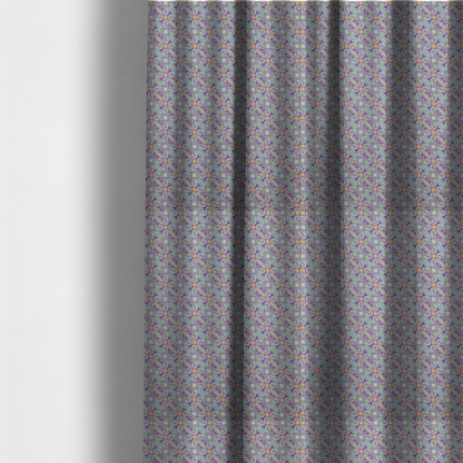 The fabric used to create these made-to-measure curtains is a intricate, geometric optical pattern with a mesmerizing, rhythmic repeat and a soft, textured finish.