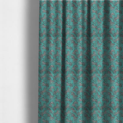 The fabric used to create these made-to-measure curtains is a playful, modern wildlife pattern with a rhythmic, repeating animal motif.