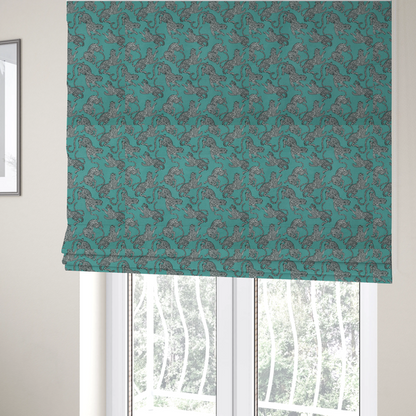The fabric used to create these Roman blinds is a playful, modern wildlife pattern with a rhythmic, repeating animal motif.
