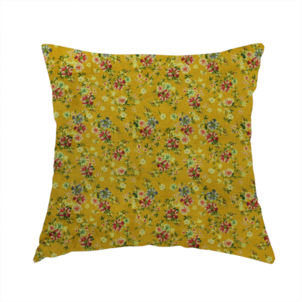 The fabric used to create this handmade cushion is a delicate, vintage-style floral pattern with a warm, sun-drenched aesthetic.
