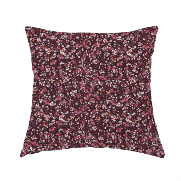 The fabric used to create this handmade cushion is a dense, monochromatic ditsy floral pattern with a rich, romantic aesthetic.