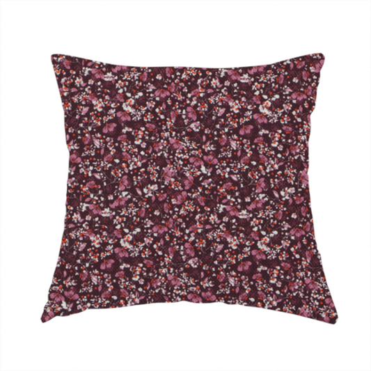 The fabric used to create this handmade cushion is a dense, monochromatic ditsy floral pattern with a rich, romantic aesthetic.
