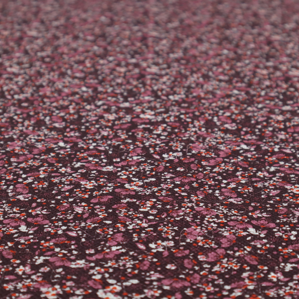 A dense, monochromatic ditsy floral pattern with a rich, romantic aesthetic.