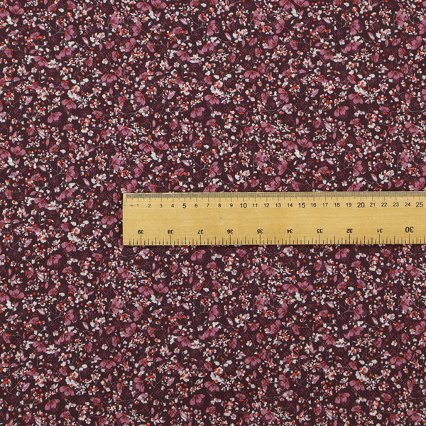 A dense, monochromatic ditsy floral pattern with a rich, romantic aesthetic.