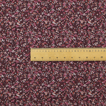 A dense, monochromatic ditsy floral pattern with a rich, romantic aesthetic.