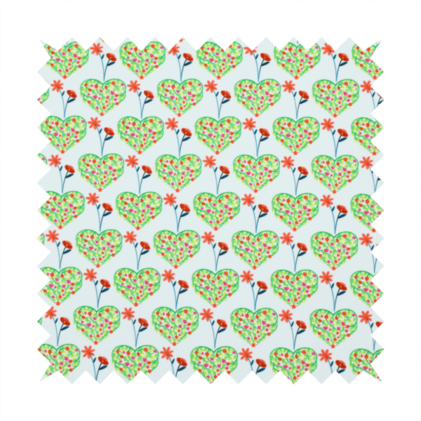 This fabric shows a repeating pattern on a light blue-grey background. The pattern consists of rows of heart shapes made of green vines and small pink and red flowers. Each heart is topped with a red flower on a thin blue stem and flanked by another red flower on its own blue stem. These floral elements repeat across the entire fabric.