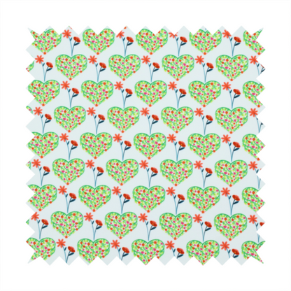 This fabric shows a repeating pattern on a light blue-grey background. The pattern consists of rows of heart shapes made of green vines and small pink and red flowers. Each heart is topped with a red flower on a thin blue stem and flanked by another red flower on its own blue stem. These floral elements repeat across the entire fabric.