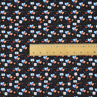 This black fabric features a dense, romantic Valentine’s Day theme with a repeating pattern of watercolour-style motifs. The design includes blue and red hearts, small sealed envelopes, red bows, and calendar pages marked with the number "14". 