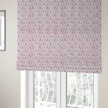 The fabric used for these Roman blinds is a white fabric featuring a light, whimsical Valentine’s Day pattern with watercolour elements scattered across a pale background. The design includes pink heart-shaped balloons tied with bows, soft pink feathers, and various small arrows and hearts. Faint, dreamy cloud-like textures in pink and blue are visible in the background, adding to the soft, airy aesthetic.