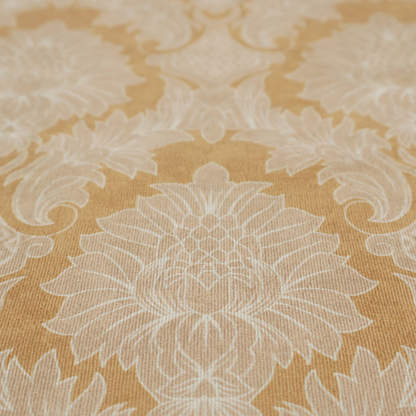 An elegant damask fabric featuring a repeating, symmetrical floral and leaf medallion pattern in cream over a warm ochre-gold background.
