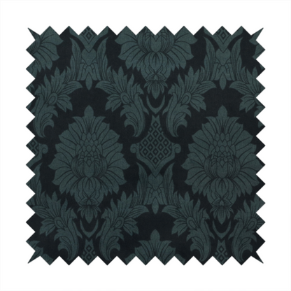 A dramatic, dark damask fabric featuring a large-scale floral medallion pattern in charcoal grey over a deep matte black background.