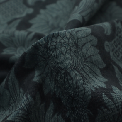 A dramatic, dark damask fabric featuring a large-scale floral medallion pattern in charcoal grey over a deep matte black background.