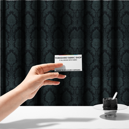 The fabric used to create these made-to-measure fabrics is a dramatic, dark damask fabric featuring a large-scale floral medallion pattern in charcoal grey over a deep matte black background.