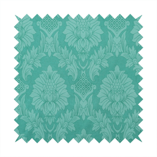 Vibrant teal damask fabric featuring a large-scale, repeating floral and acanthus leaf pattern in a tonal, monochromatic seafoam green colourway.