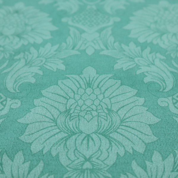 Vibrant teal damask fabric featuring a large-scale, repeating floral and acanthus leaf pattern in a tonal, monochromatic seafoam green colourway.