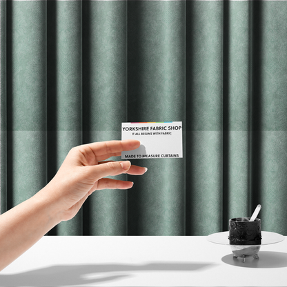 The fabric used to create these made-to-measure curtains is a pale ice blue damask fabric with a subtle, low-contrast floral medallion pattern in light pastel tones.