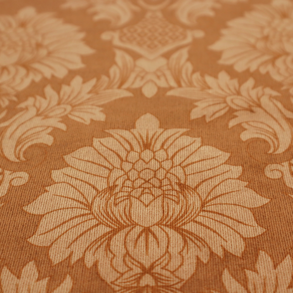 Warm brown damask fabric featuring a large-scale, repeating floral and acanthus leaf pattern in shimmering copper tones.