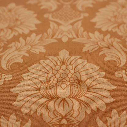 Warm brown damask fabric featuring a large-scale, repeating floral and acanthus leaf pattern in shimmering copper tones.