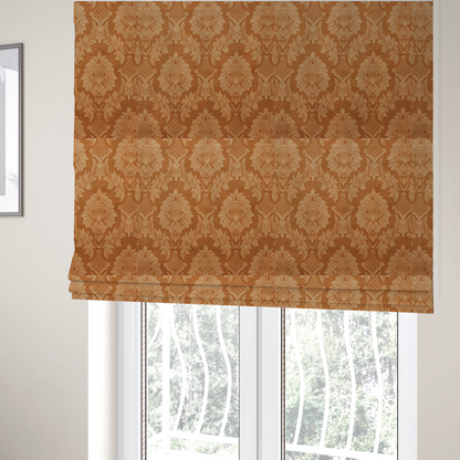 The fabric used to create these Roman blinds is a warm brown damask fabric featuring a large-scale, repeating floral and acanthus leaf pattern in shimmering copper tones.
