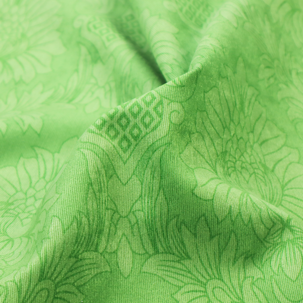 Vibrant apple green damask fabric featuring a repeating, large-scale floral medallion and acanthus leaf pattern in a tonal monochromatic colourway.