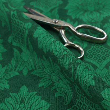 Deep emerald green damask fabric featuring a large-scale, repeating floral and acanthus leaf pattern in a rich tonal colourway.