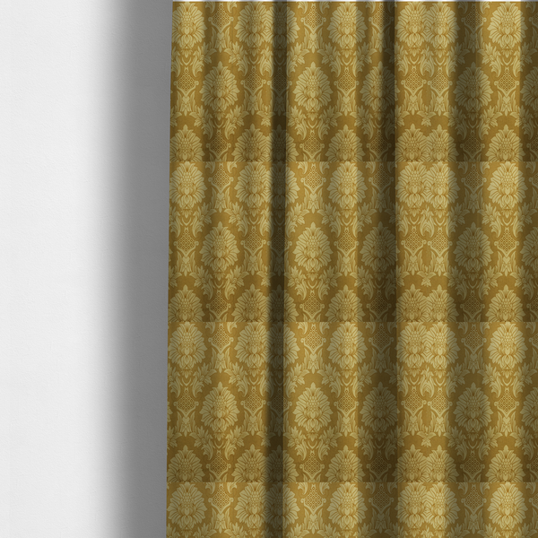 The fabric used to create these made-to-measure curtains is a high-contrast damask fabric featuring a shimmering champagne-gold floral medallion pattern over a matte antique bronze background.
