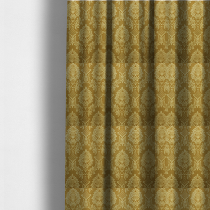The fabric used to create these made-to-measure curtains is a high-contrast damask fabric featuring a shimmering champagne-gold floral medallion pattern over a matte antique bronze background.