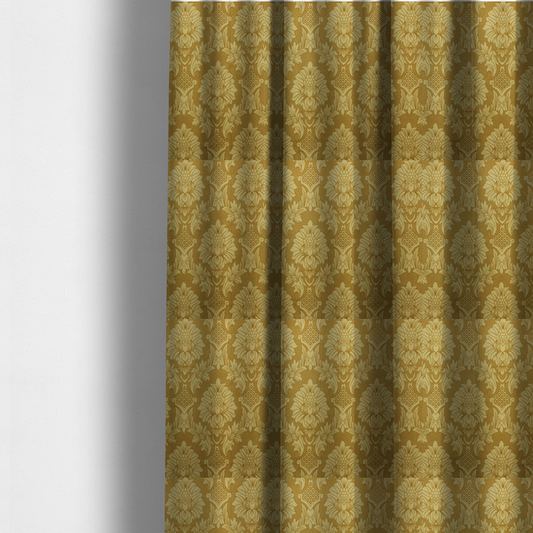 The fabric used to create these made-to-measure curtains is a high-contrast damask fabric featuring a shimmering champagne-gold floral medallion pattern over a matte antique bronze background.