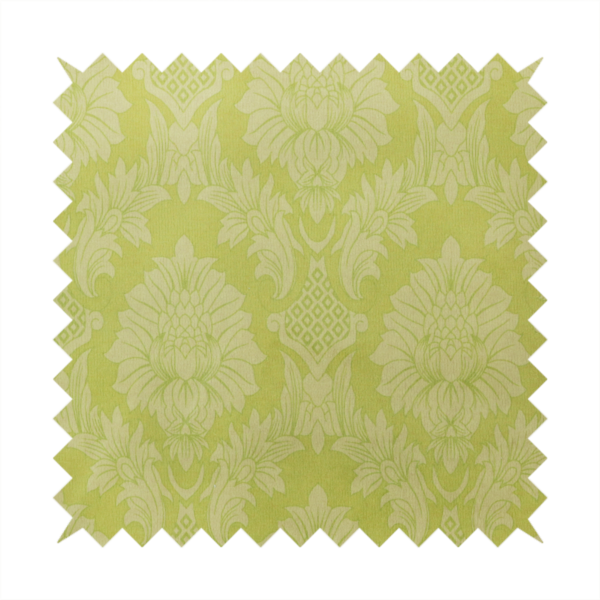 Bright lime-yellow damask fabric featuring a repeating, large-scale floral medallion pattern in a soft tonal colourway.