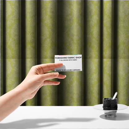 The fabric used to create these made-to-measure curtains is a bright lime-yellow damask fabric featuring a repeating, large-scale floral medallion pattern in a soft tonal colourway.