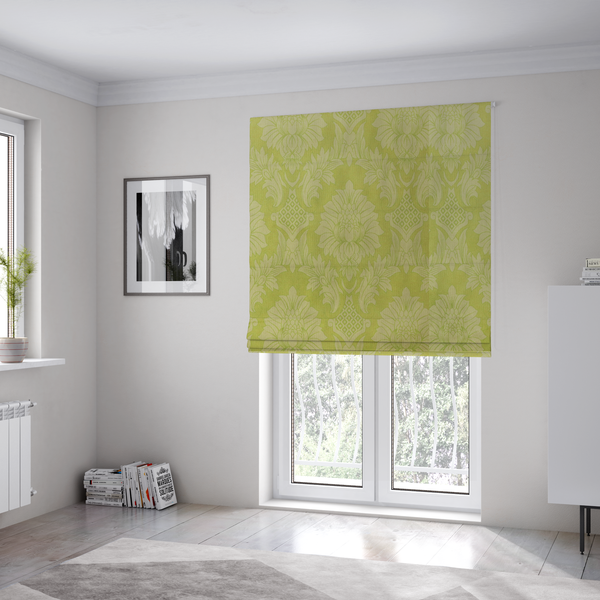 The fabric used to create these Roman blinds is a bright lime-yellow damask fabric featuring a repeating, large-scale floral medallion pattern in a soft tonal colourway.