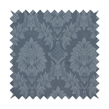 Sophisticated slate blue damask fabric featuring a large-scale, repeating floral and acanthus leaf pattern in a tonal, steel grey colourway.