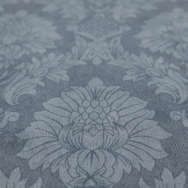 Sophisticated slate blue damask fabric featuring a large-scale, repeating floral and acanthus leaf pattern in a tonal, steel grey colourway.