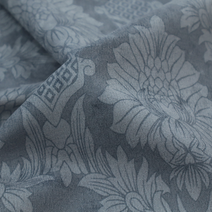 Sophisticated slate blue damask fabric featuring a large-scale, repeating floral and acanthus leaf pattern in a tonal, steel grey colourway.