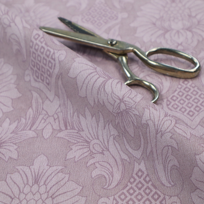 Elegant lavender damask fabric featuring a large-scale, repeating floral and acanthus leaf pattern in a soft tonal lilac colourway.