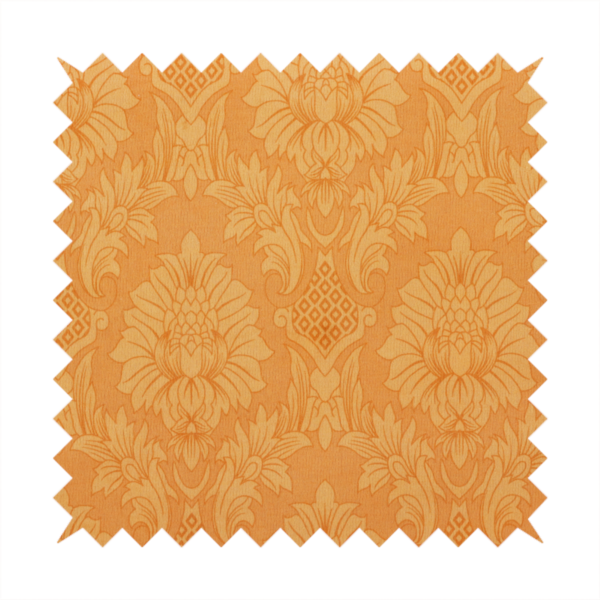 A bright apricot-orange damask fabric with a large-scale, repeating floral and acanthus leaf pattern in a soft tonal colourway.